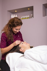 Obraz premium Young women having a cosmetic treatment