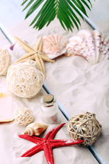 Beautiful seashells on sand background
