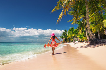 Carefree, Young woman relaxing on the islands beach