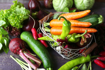 Heap of fresh vegetables on table close up