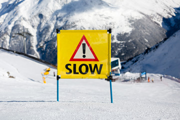 Yellow slow sign