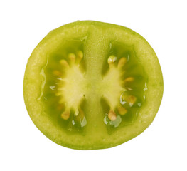 Half of green tomato isolated on white