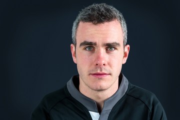 A rugby player looking at the camera