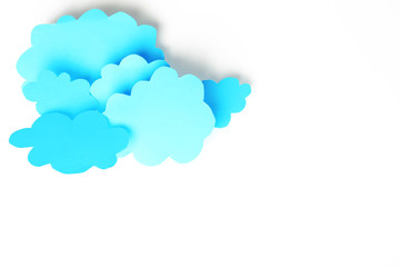 Blue paper clouds, isolated on white. Cloud computing concept.