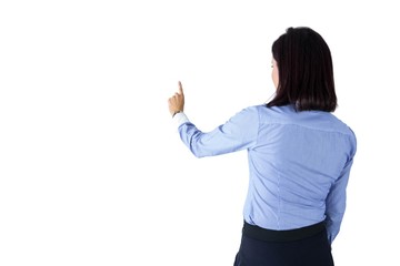 Businesswoman standing and pointing