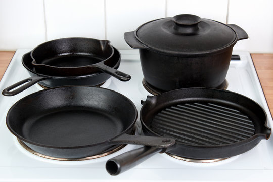 Seasoned Cast Iron Cookware On Electric Stove