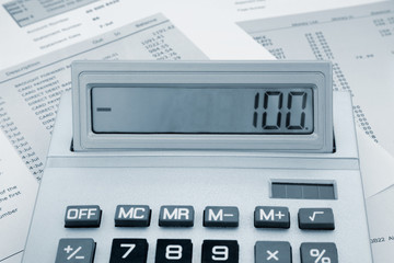 Close up of a calculator on a bank statement