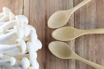 Shimeji mushroom and wooden spoon.