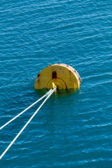 White Rope to Yellow Mooring in Blue Water
