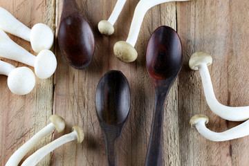 Shimeji mushroom and wooden spoon.