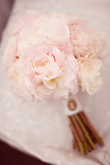 Delicate peonies wedding bouquet