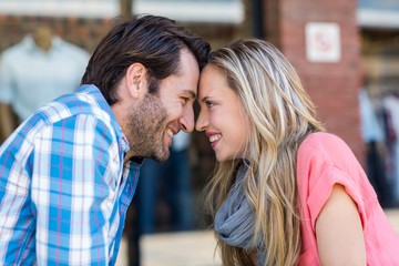  Cute couple sitting at a cafe head to head