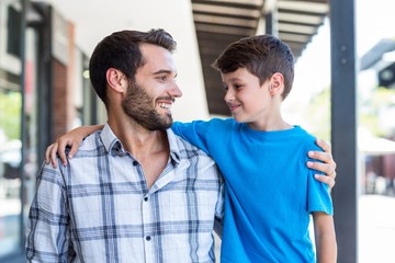 Son and father look at each other 