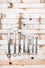 Set of tools on wooden background