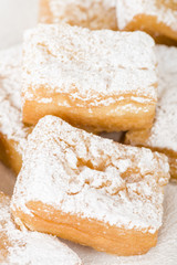 Yum Yum - Sweet toffee flavoured fried pastry dusted with icing sugar.
