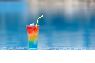 Cocktail at the edge of the swimming pool