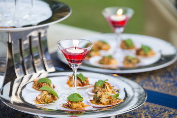 Luxury food and drinks on wedding table.