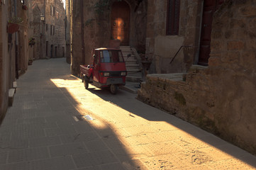 Italian old ancient alley in the medieval Tuscan town