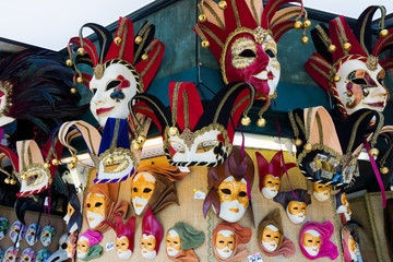 Various venetian masks on sale . colorful artistic masks on the