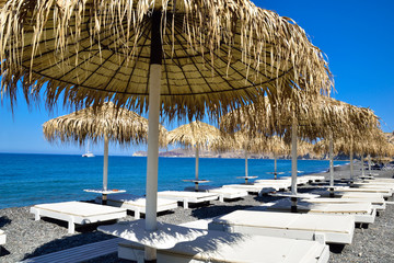 Sea beach with seats and umbrellas in Tenerife island, Canary - Spain