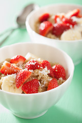 healthy breakfast quinoa with strawberry banana coconut flakes
