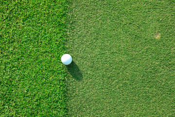 Golf ball sitting on apron fringe