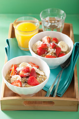healthy breakfast quinoa with strawberry banana coconut flakes