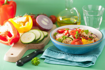 healthy couscous salad with tomato pepper zucchini onion
