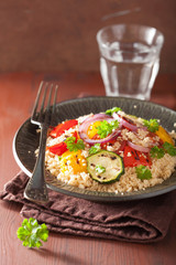 healthy couscous salad with tomato pepper zucchini onion