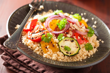 healthy couscous salad with tomato pepper zucchini onion
