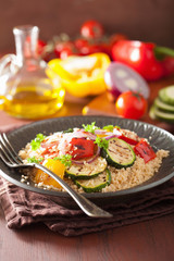 healthy couscous salad with tomato pepper zucchini onion