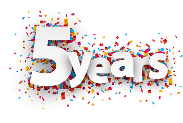 Five years paper confetti sign.