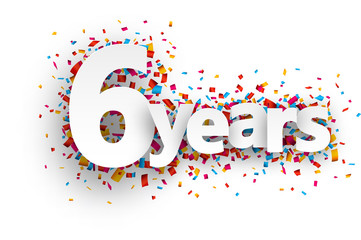 Six years paper confetti sign.
