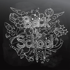 Back to School Scribbles on a Black Chalkboard.