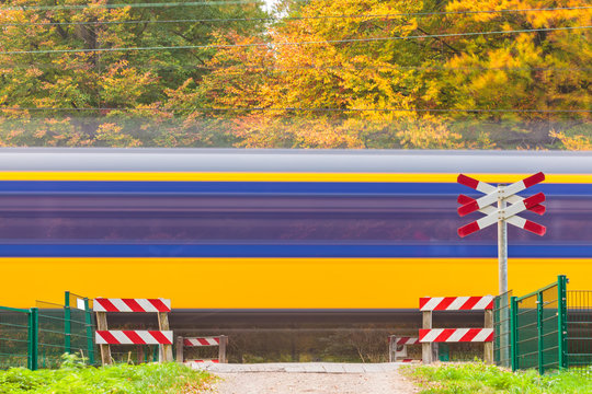 Dutch train passing a crossing
