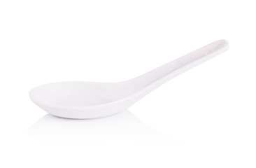 White empty ceramic spoon for soup on white background
