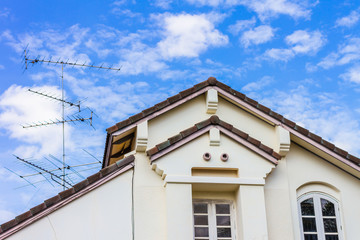 housetop with blue sky