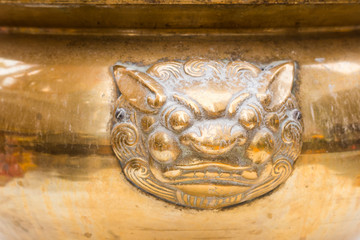 Closeup of  Joss Stick Burner Showing The Lion Head