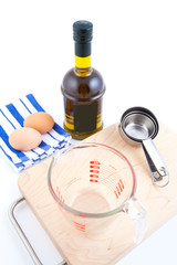 Eggs and olive oil, ready to be measured