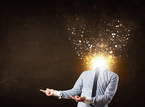 Business man with glowing exploding head