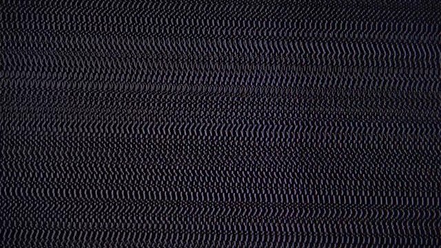 Looping TV static noise background, detuned analogue television flickering screen