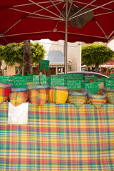 Creole colored spices at local market.