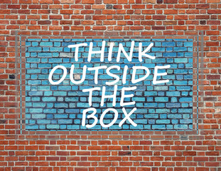 Sign on brick wall to thinking outside the box great brilliant i