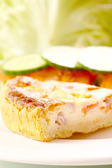 Quiche salad.
A piece of Quiche Lorraine with salad.