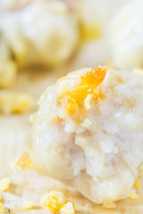 chinese dim sum and garlic fried on wooden board