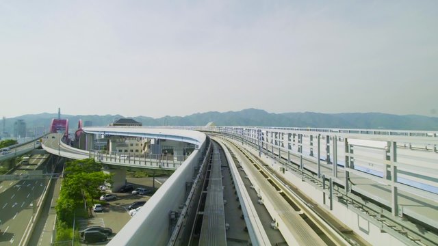 Point of view real-time ride through Kobe Japan on the Portliner Monorail.