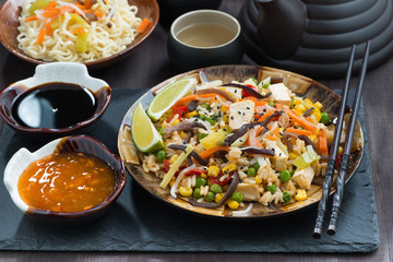 asian lunch - fried rice with tofu and vegetables, horizontal