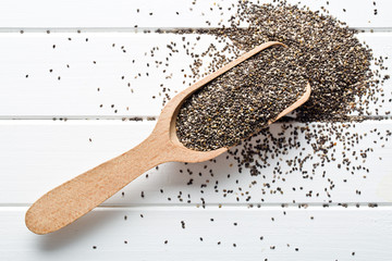 chia seeds in wooden scoop