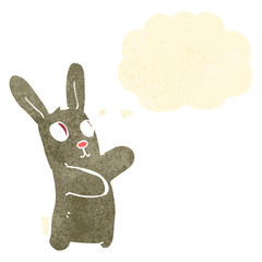 retro cartoon spooky dancing rabbit with thought bubble