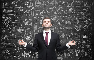 Meditative businessman is looking for the best solution for the business development process....